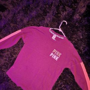 Long sleeve Pink shirt.